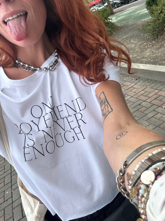 One Boyfriend Is Never Enough Cropped T-Shirt - white, White cropped tee with minimalist black text that reads βOne Boyfriend Is Never Enough,β worn by a confident woman with a sassy attitude. adult humor tees, lifestyle, alternate lifestyles, red head tees, lgbtq tees, pride tees, One Boyfriend Is Never Enough Cropped T-Shirt - white, White cropped tee with minimalist black text that reads βOne Boyfriend Is Never Enough,β worn by a confident woman with a sassy attitude. adult humor tees, lifestyle, alterna