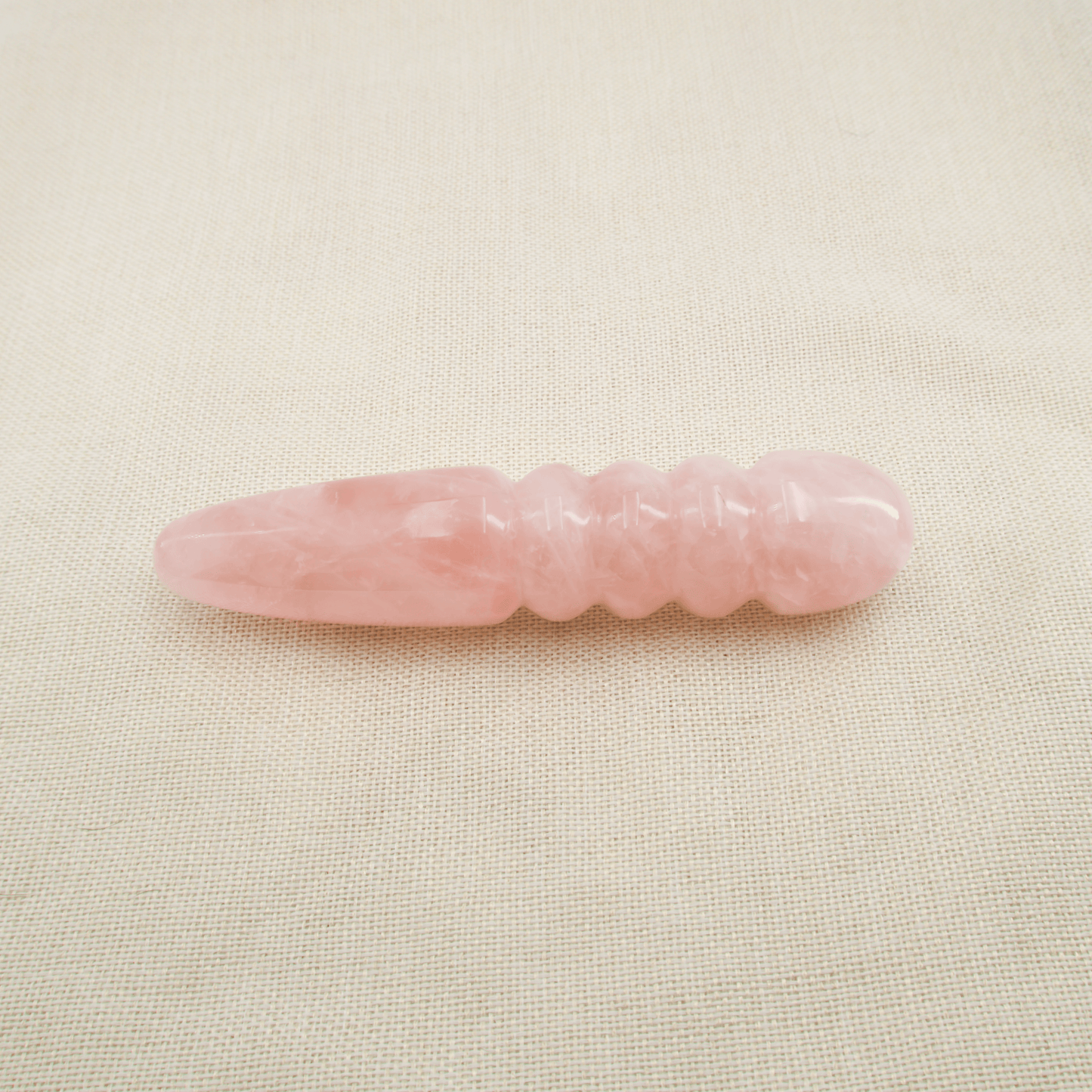Unduluna: Elegant Rose Quartz Crystal Wand for Healing