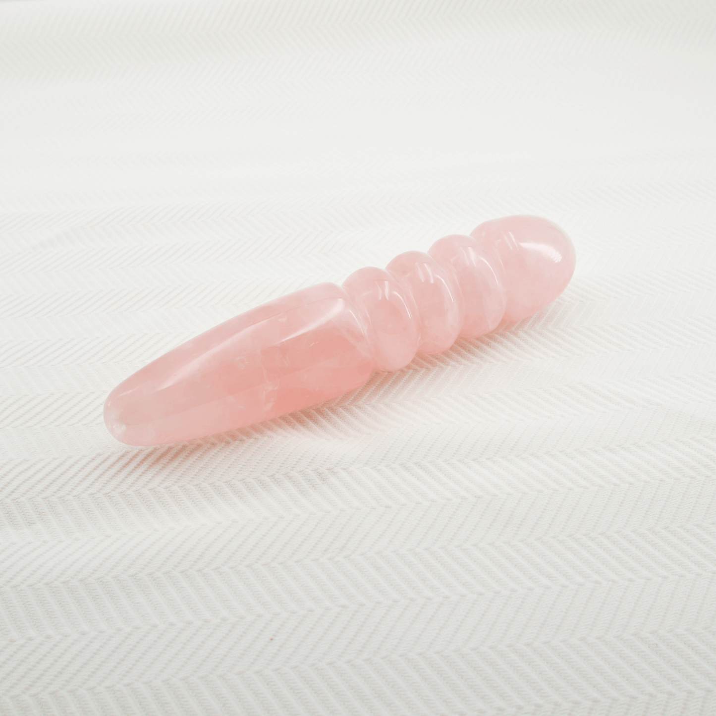 Unduluna: Elegant Rose Quartz Crystal Wand for Healing