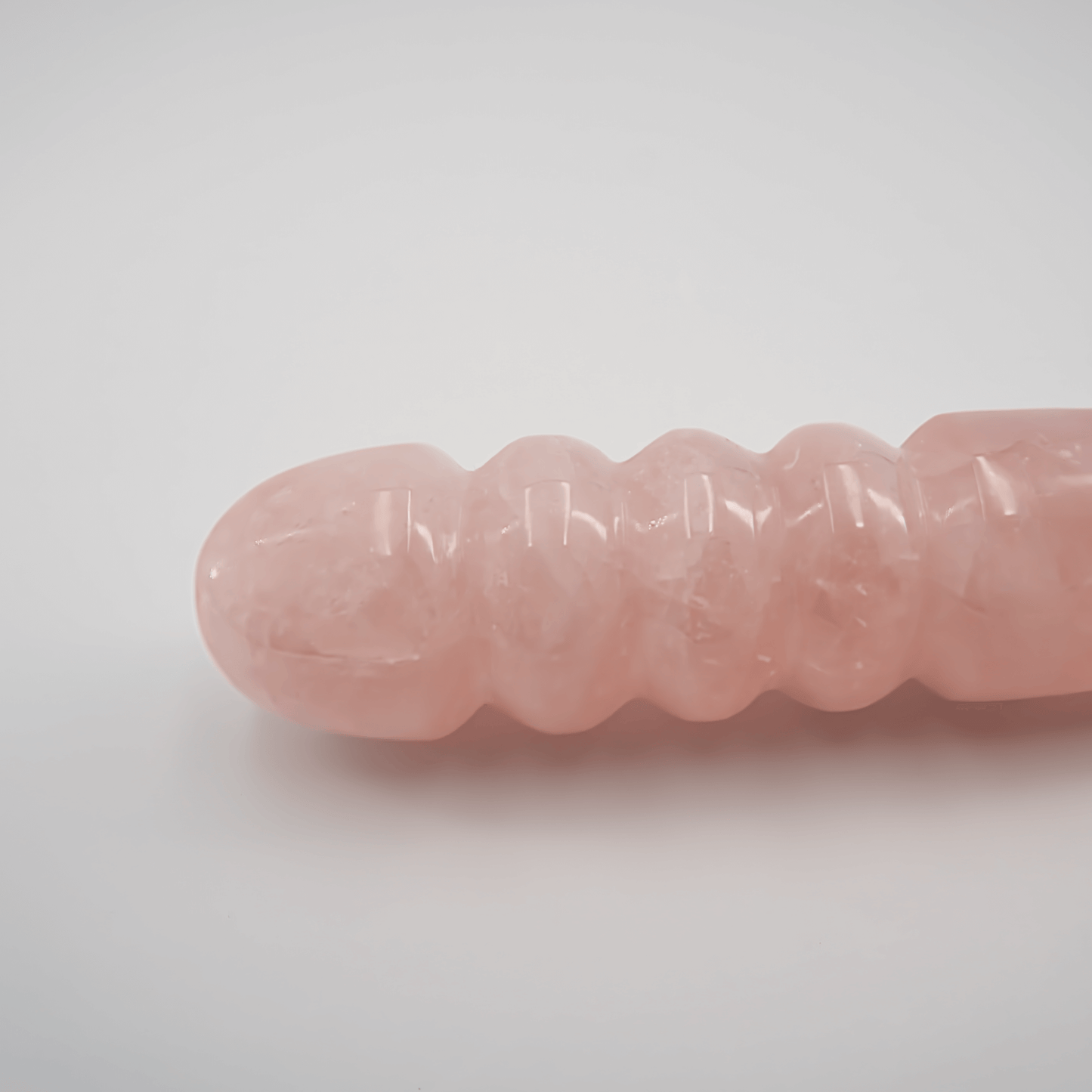 Unduluna: Elegant Rose Quartz Crystal Wand for Healing